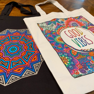 Custom printed tote bags with colourful artwork and eco-friendly cotton fabric