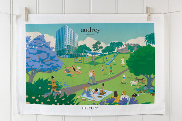 Digitally printed landscape tea towel with vibrant park and community art scene