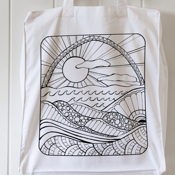 White cotton tote bag with black custom artwork – flat lay view