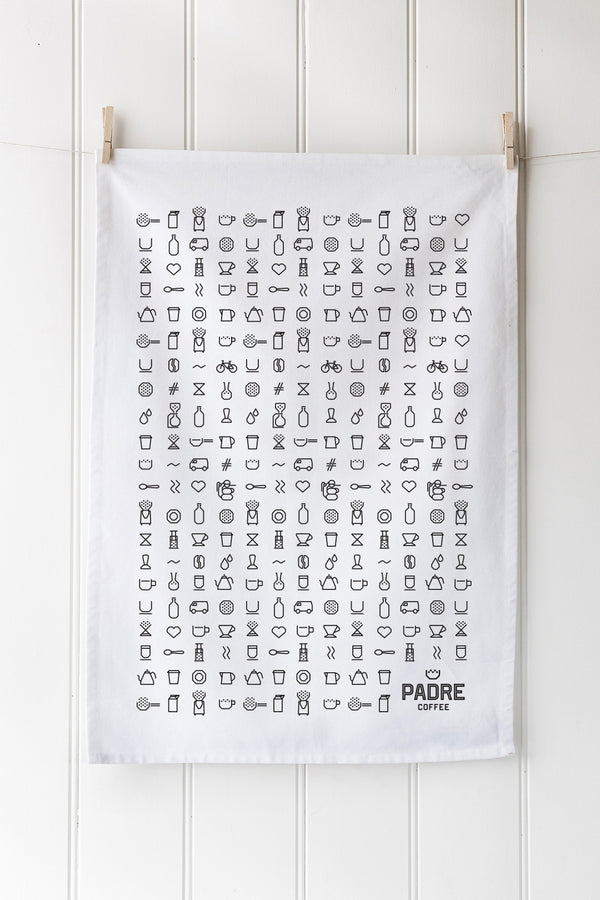 White organic cotton tea towel with black screen printed calendar design – perfect as a sustainable souvenir or gift.