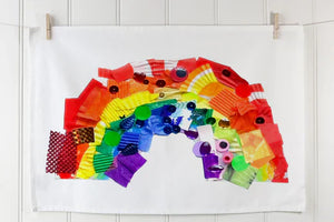 Children’s handmade collage artwork printed on a white organic cotton tea towel.