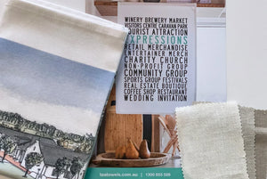 Tea towels linen fabric samples and printed towel display from Expressions Tea Towels