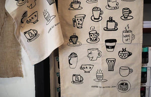 Custom printed tea towels with coffee cup sketches at Brew Shack, made with organic cotton 