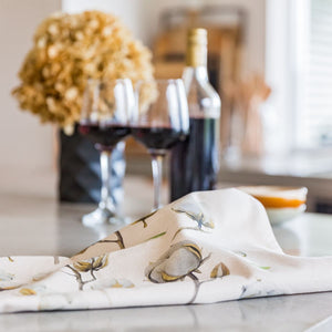 Premium linen-cotton blend tea towel styled in Australian kitchen with wine and glassware