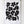 White cotton tea towel with black floral pattern hanging on white wall