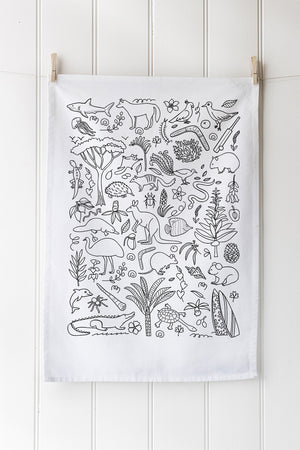 Tea towel with black line art of Australian animals and nature on a white background