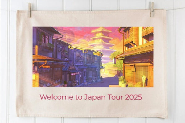 PersonalisedTea Towel with a colorful illustration of Japanese architecture and 'Welcome to Japan Tour 2025' text.