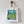 White tote bag with a colorful graphic design hanging on a wooden hook against a white paneled wall.