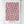 White tea towel with red geometric pattern hanging on a wooden rack.