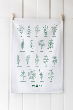 Tea towel with green herb illustrations with customisable logo on a white background
