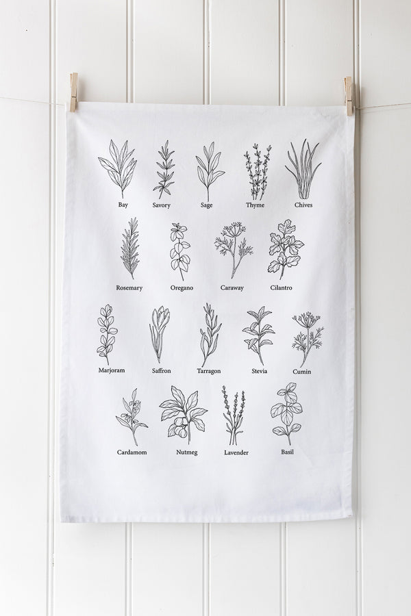 White cotton tea towel with herb design in black