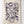 Tea towel with kitchen utensil illustrations and customers logo branding on a white wooden background