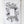 Floral design on a white tea towel hanging against a white wooden panel background