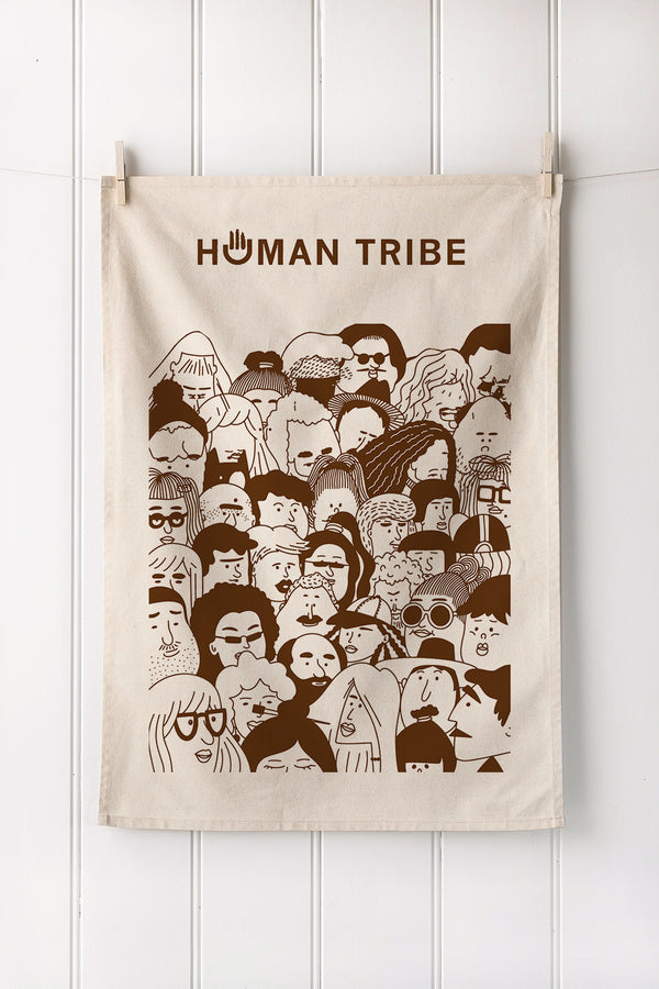 Natural tea towel with people design add your own logo on a white wooden background